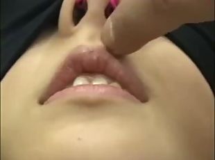 Japanese girl with a nose hook give a blowjob