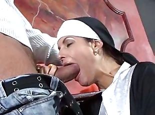 Filthy hot nun deliciously feeds her sinful mouth with a massive errect cock