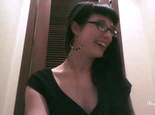 Sexy brunette with piercing and glasses strips in webcam show