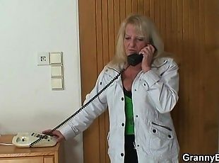 Blonde grandma in black stockings fucks