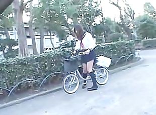 Japanese Girl riding a Vibrating Bicycle thru the City (Public Squi...