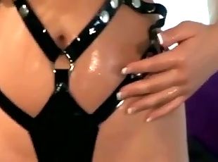 Busty babe fucks in fishnets and latex lingerie